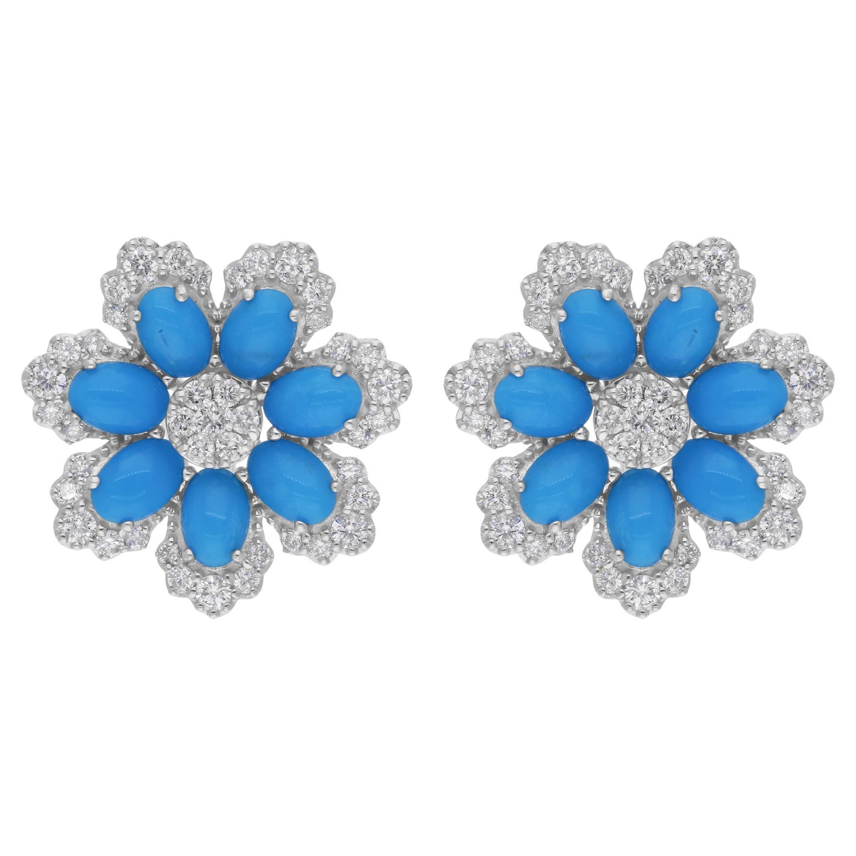 Cast from 14-karat gold, these exquisite earrings are handset with 4.93 carats turquoise and 1.60 carats of sparkling diamonds.

FOLLOW SPECTRUM JEWELS storefront to view the latest collection & exclusive pieces. Spectrum Jewels is proudly rated as