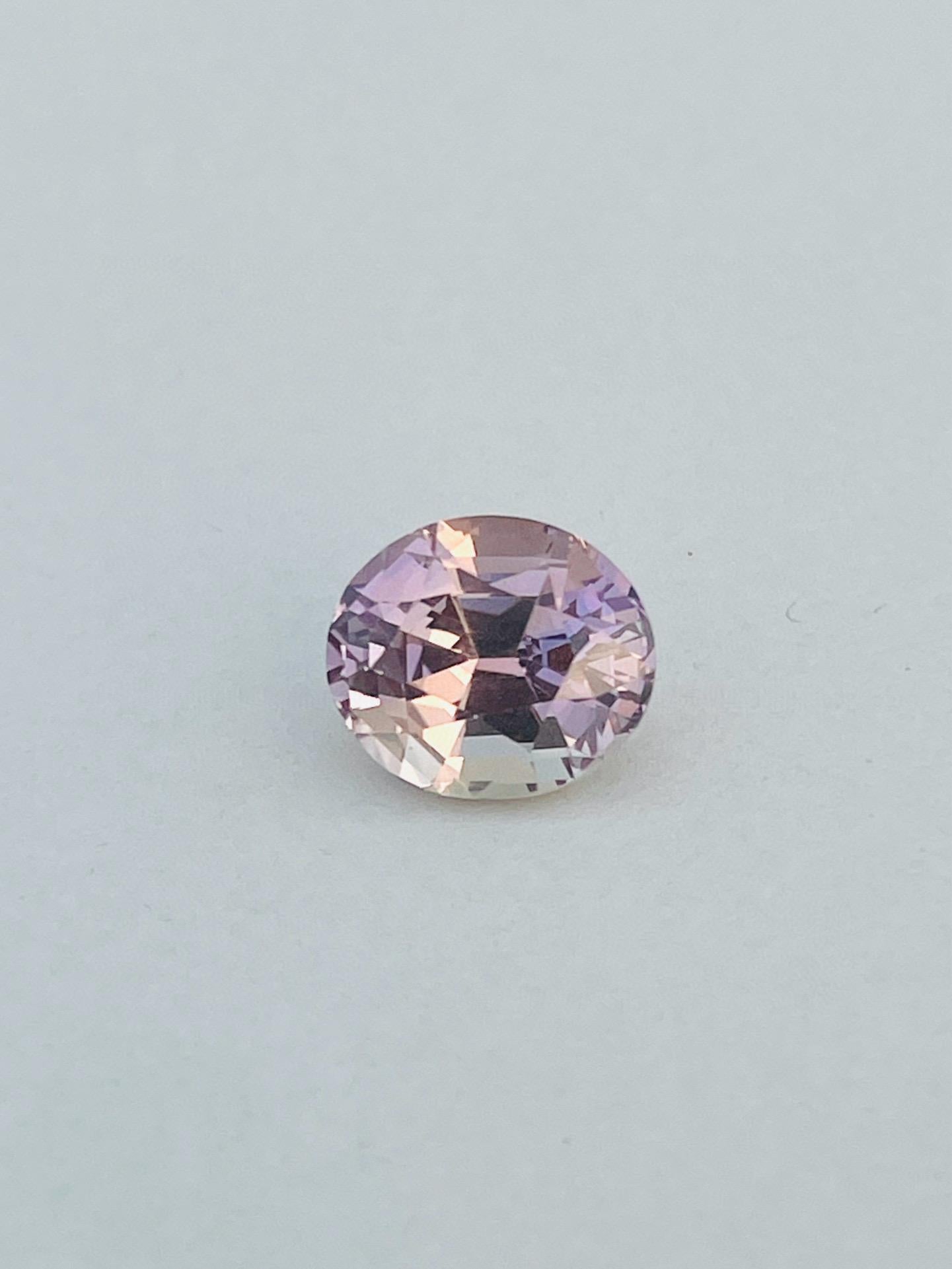Brilliant Cut 4.93 Carats Rare Unheated Tanzanite zoisite pinkish Brown Bi color For Sale