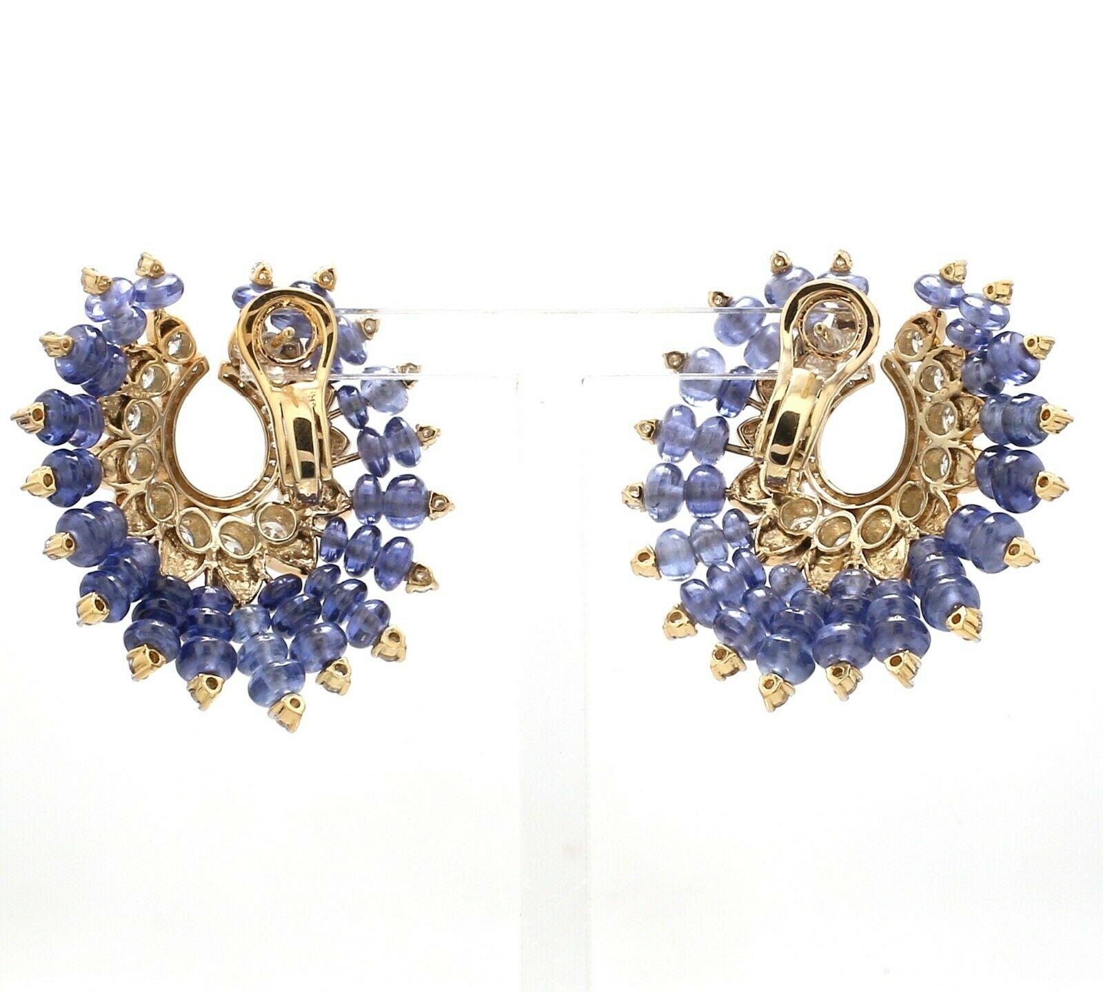 Modern 49.30 Carat Tanzanite 3.0 Carat Diamond 18 Karat Gold Earrings For Sale