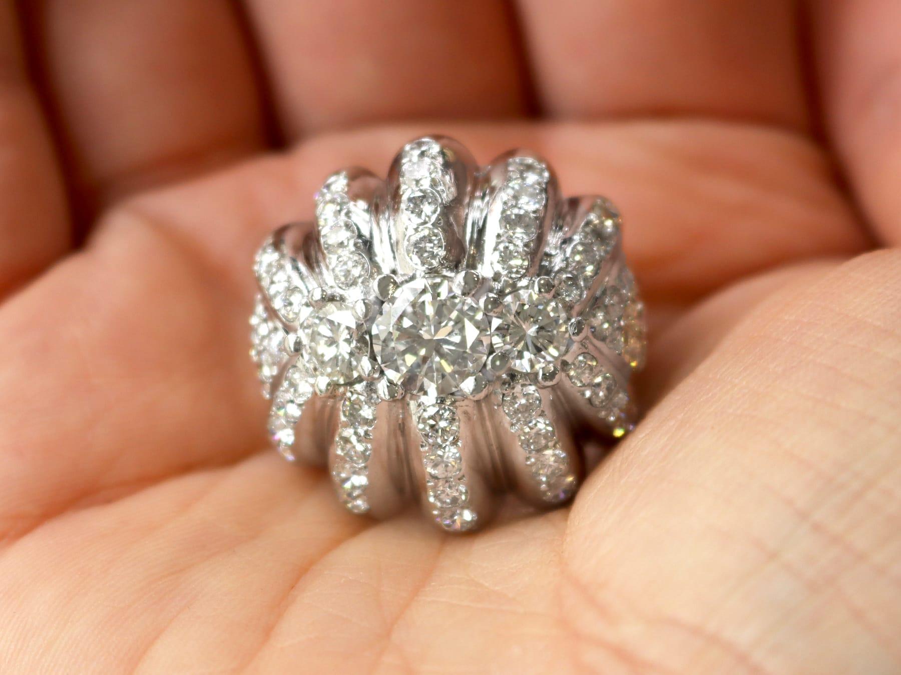A stunning large vintage 4.94 carat diamond and platinum cocktail ring; part of our diverse diamond jewelry and estate jewelry collections.

This stunning, fine and impressive vintage cocktail ring has been crafted in platinum.

The substantial,