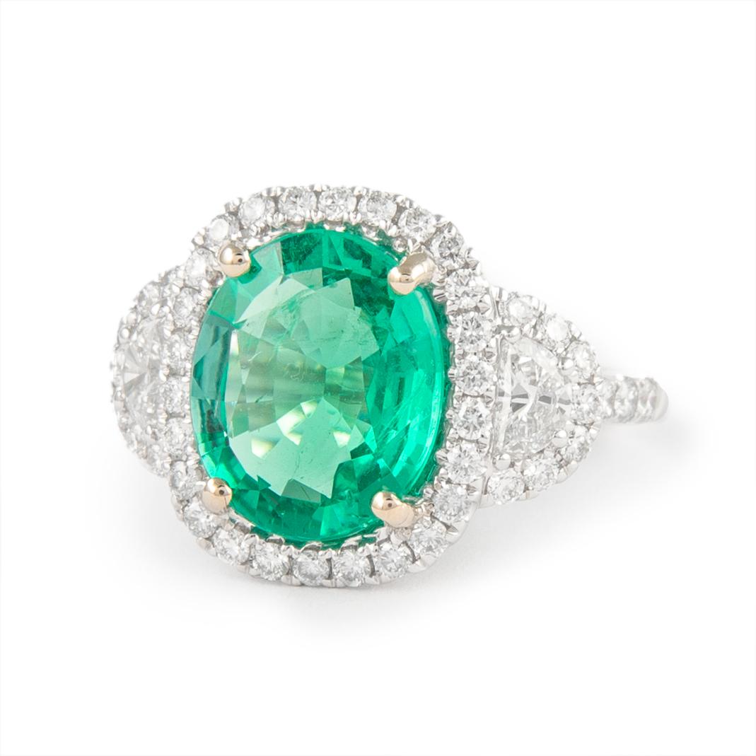 Contemporary 4.94 Carat Emerald with Diamond Three Stone Halo Ring 18 Karat Gold