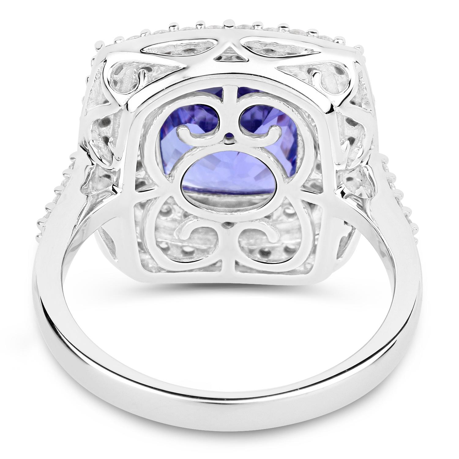 Contemporary 4.94 Carat Tanzanite and Diamond 14 Karat White Gold Cocktail Ring For Sale