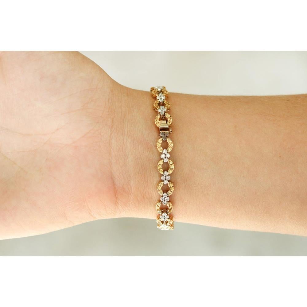 Elegantly displayed is a stunning bracelet with 4.94cts of radiant yellow sapphires and diamonds. This luxurious item will make an ideal gift or new addition to any collection. A total of one-hundred eighty six fully faceted diamonds and sapphires