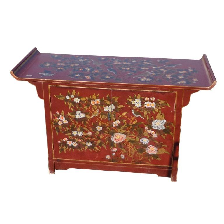 49.5? Antique Chinese alter cabinet

2 Door red cabinet hand painted in seasonal flowers.
Violets and peonies are prominent with birds intermingled on top and below on cabinet doors.
Two doors open to roomy cabinet with shelving.