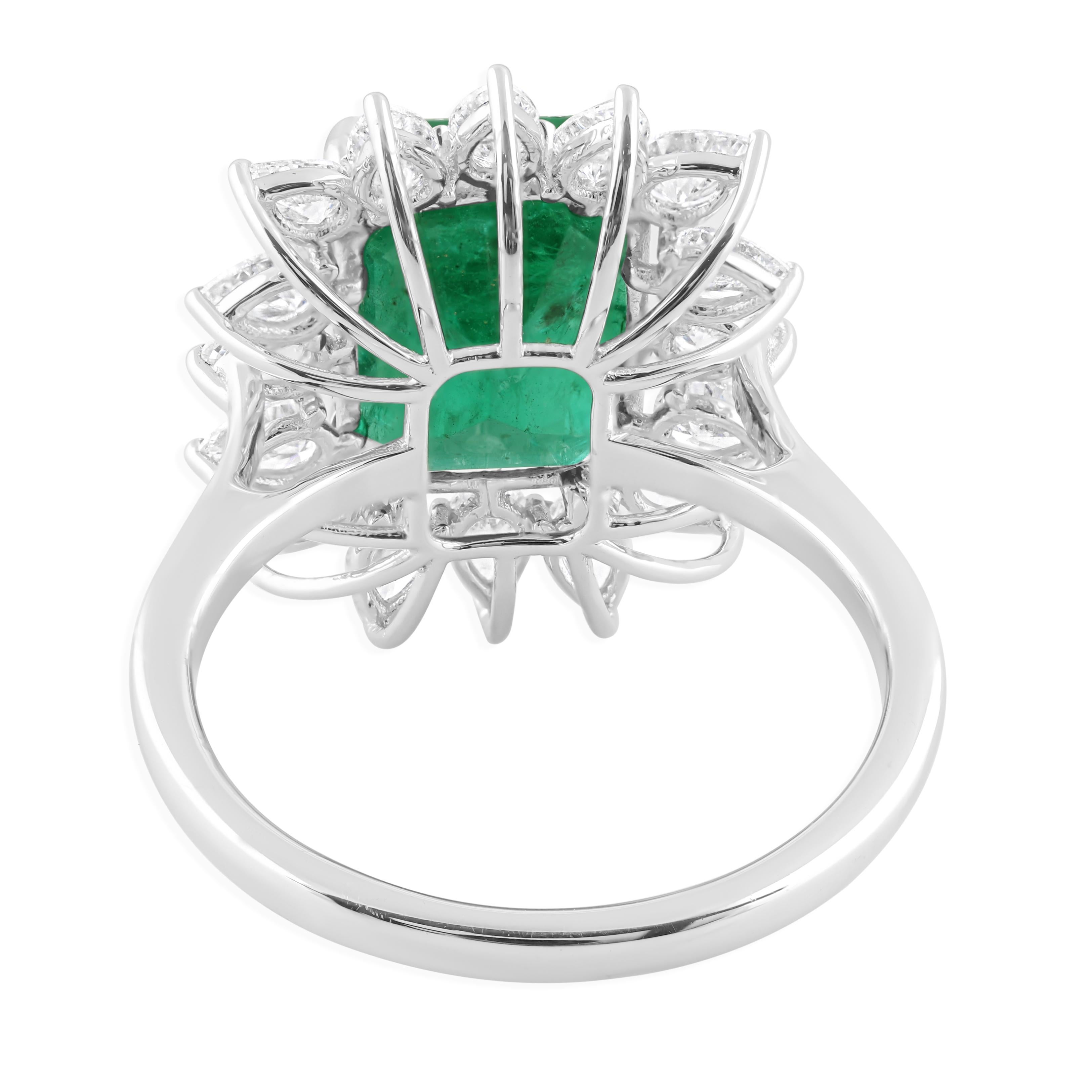 Modern 4.95 Carat Emerald 1.26 Carat SI/H Diamond 14 Karat White Gold Cocktail Ring For Sale