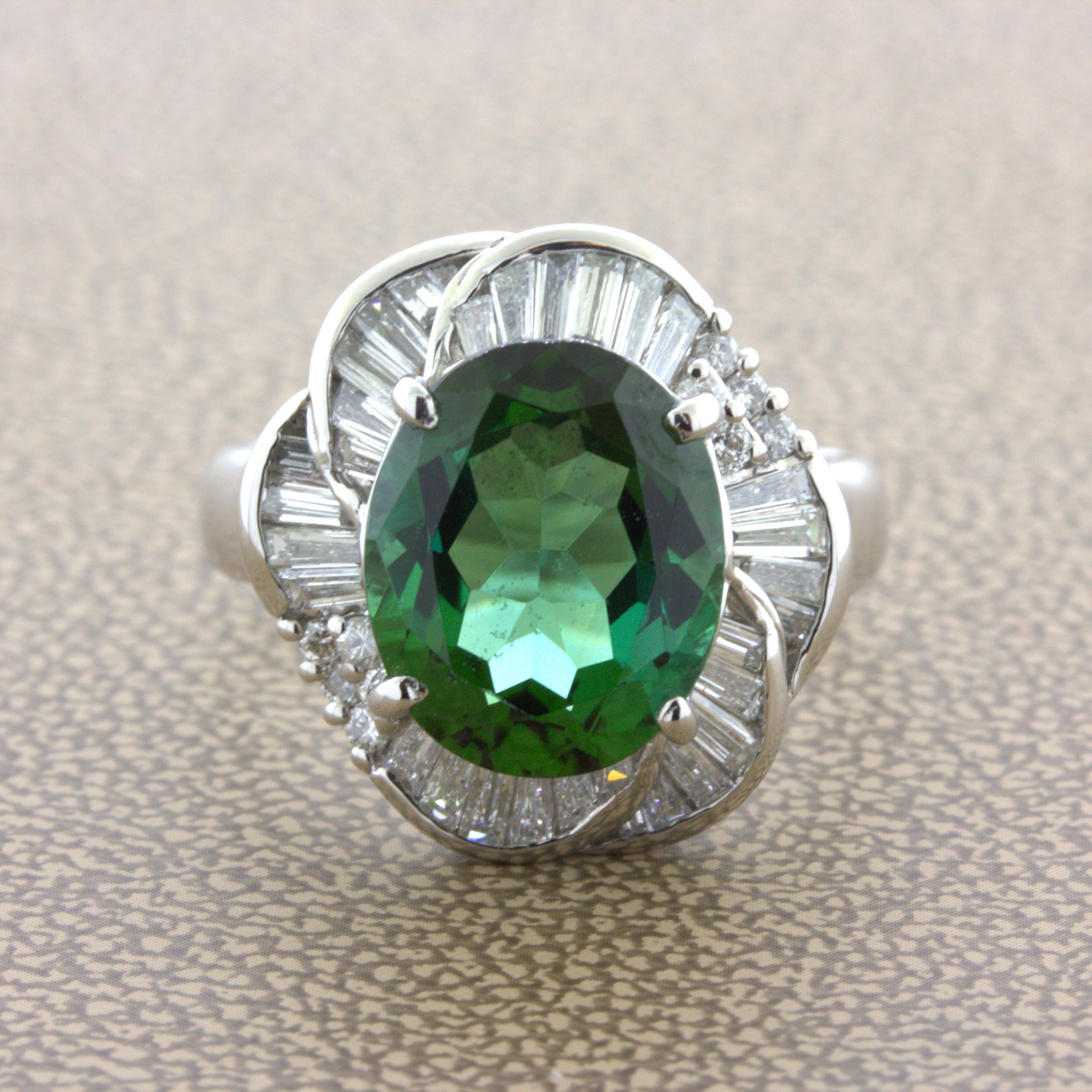 A fine gem quality indicolite tourmaline takes center stage of this diamond platinum ring. It weighs 4.95 carats and has a super rich and brilliant blue-green color known as indicolite in the trade. It is complemented by 0.97 carats of round