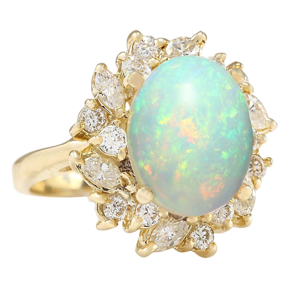 Stamped: 14K Yellow Gold
Total Ring Weight: 7.6 Grams
Total Natural Opal Weight is 3.45 Carat (Measures: 13.25x10.50 mm)
Color: Multicolor
Total Natural Diamond Weight is 1.50 Carat
Color: F-G, Clarity: VS2-SI1
Face Measures: 18.98x17.70 mm
Sku: