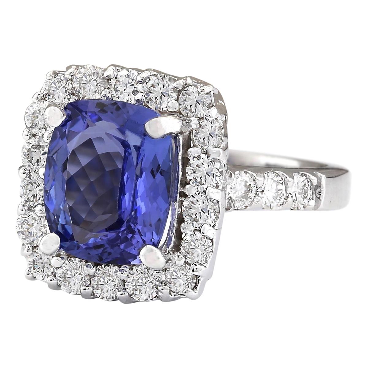 4.95 Carat Natural Tanzanite 14 Karat White Gold Diamond Ring
Stamped: 14K White Gold
Total Ring Weight: 7.3 Grams
Tanzanite Weight is 3.75 Carat (Measures: 10.00x8.00 mm)
Diamond Weight is 1.20 Carat
Color: F-G, Clarity: VS2-SI1
Face Measures: