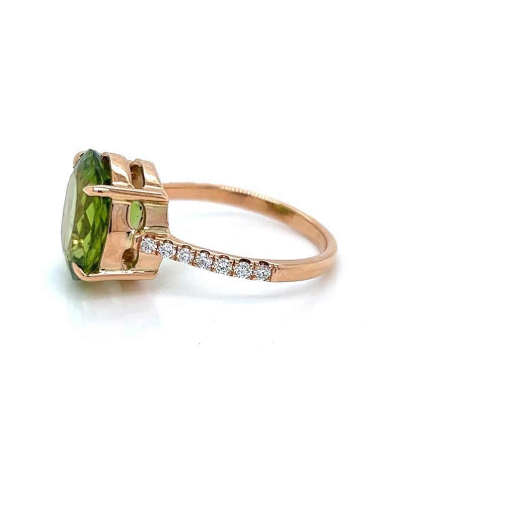 Oval Cut 4.95 Carat Oval Peridot and Diamond Ring in 9 Karat Yellow Gold For Sale