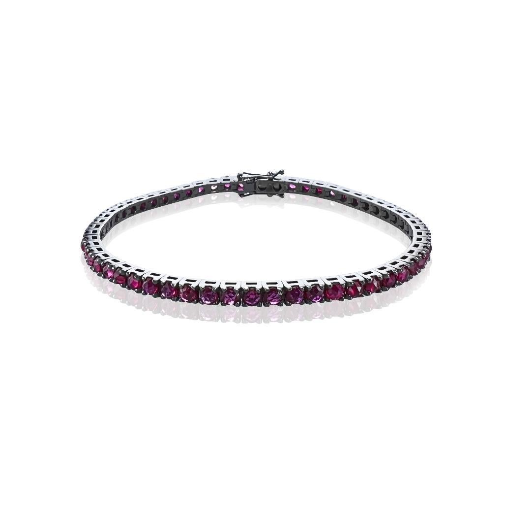 This 4.95 Carat Ruby set in 18Kt black Gold Unisex Tennis Bracelet, suits any attire whatever the occasion or time of day. 

It beautifully sparkles and can be adored alone or worn stacked with other bracelets. 

Unisex it looks equally attractive