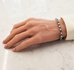 4.95 Carat Total Round Tsavorite and Baguette Diamond White Gold Bracelet