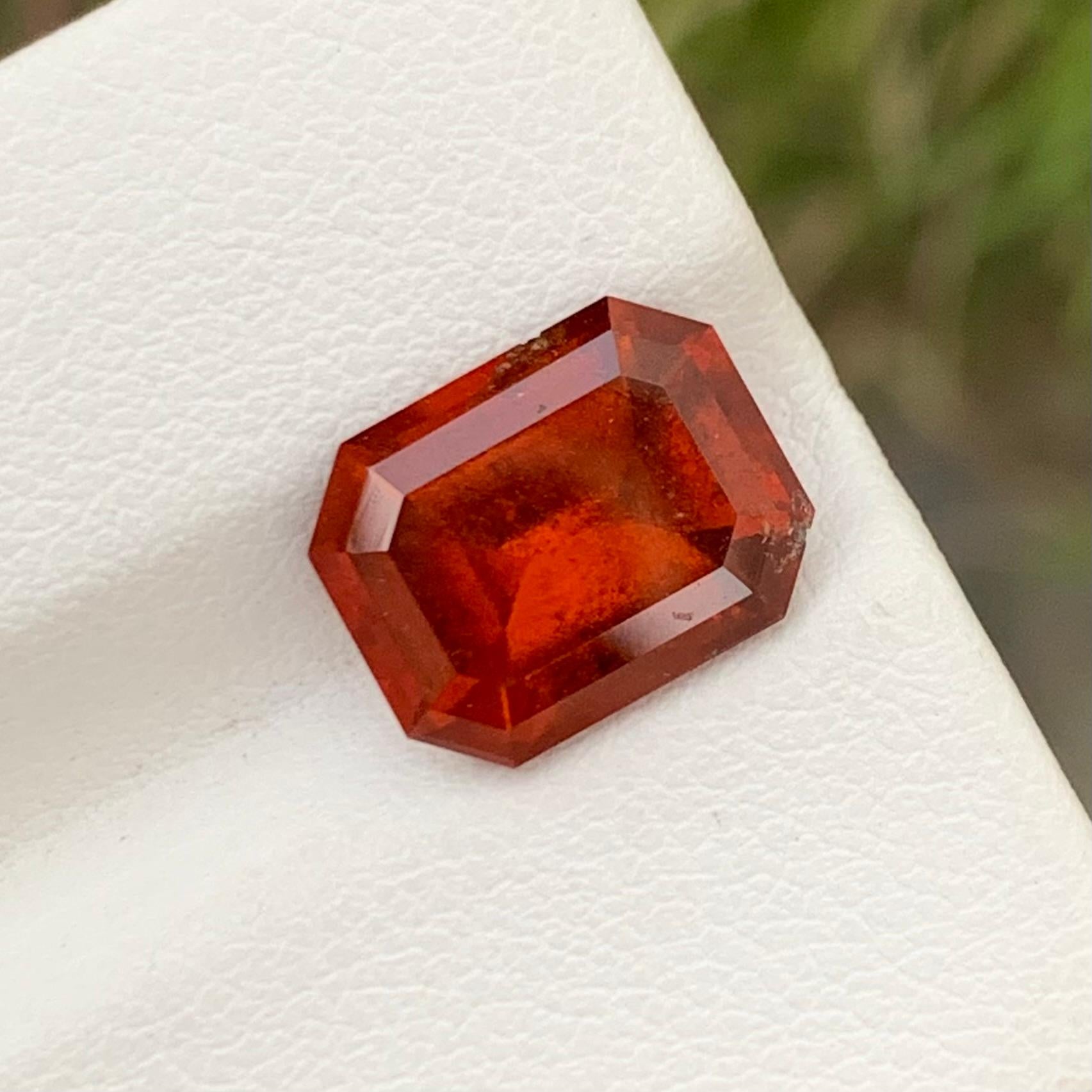 Loose Hessonite Garnet 
Weight: 4.95 Carats 
Dimension: 10.9 x 8.6 x 5.8 Mm
Colour: Smoky Orange 
Origin: Africa 
Shape: Emerald 
Certificate: On Demand 
Hessonite Garnet, a gemstone known for its warm and earthy tones, holds a distinct charm within