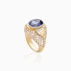 Bague en or jaune 18 carats saphir bleu 4,96 carats et diamant 3,54 carats