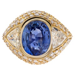 Bague en or jaune 18 carats saphir bleu 4,96 carats et diamant 3,54 carats