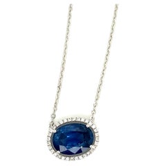 Collier pendentif en saphir bleu vif taille ovale de 4,96 carats et diamants blancs