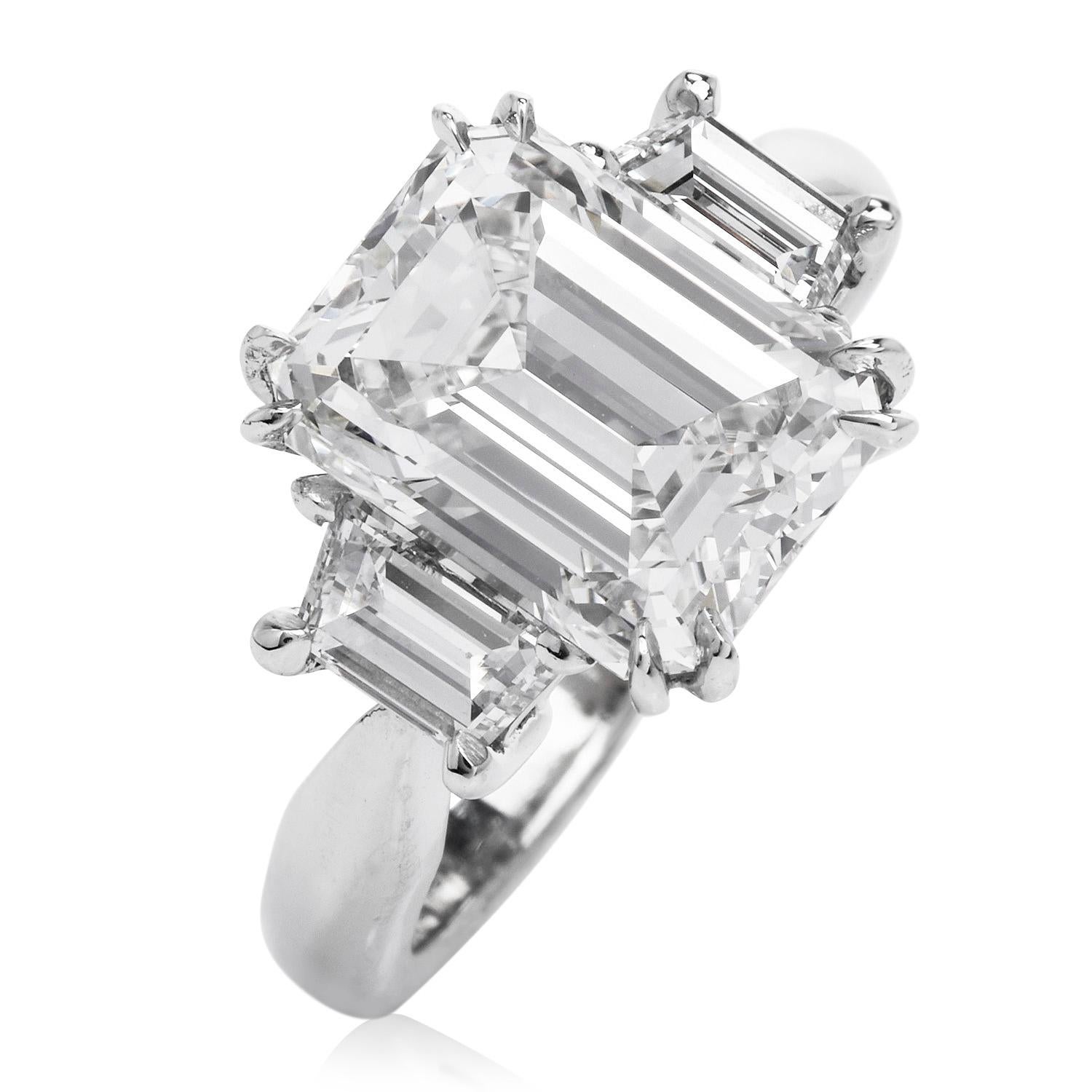 This Breathtaking Emerald-cut diamond ring is crafted in solid platinum.

It is centered by a high-quality Emerald-cut Genuine Diamond, Prong Set, icy 4.09 carat, GIA Graded I color, VS1 Clarity.

This stunning diamond is flanked by two