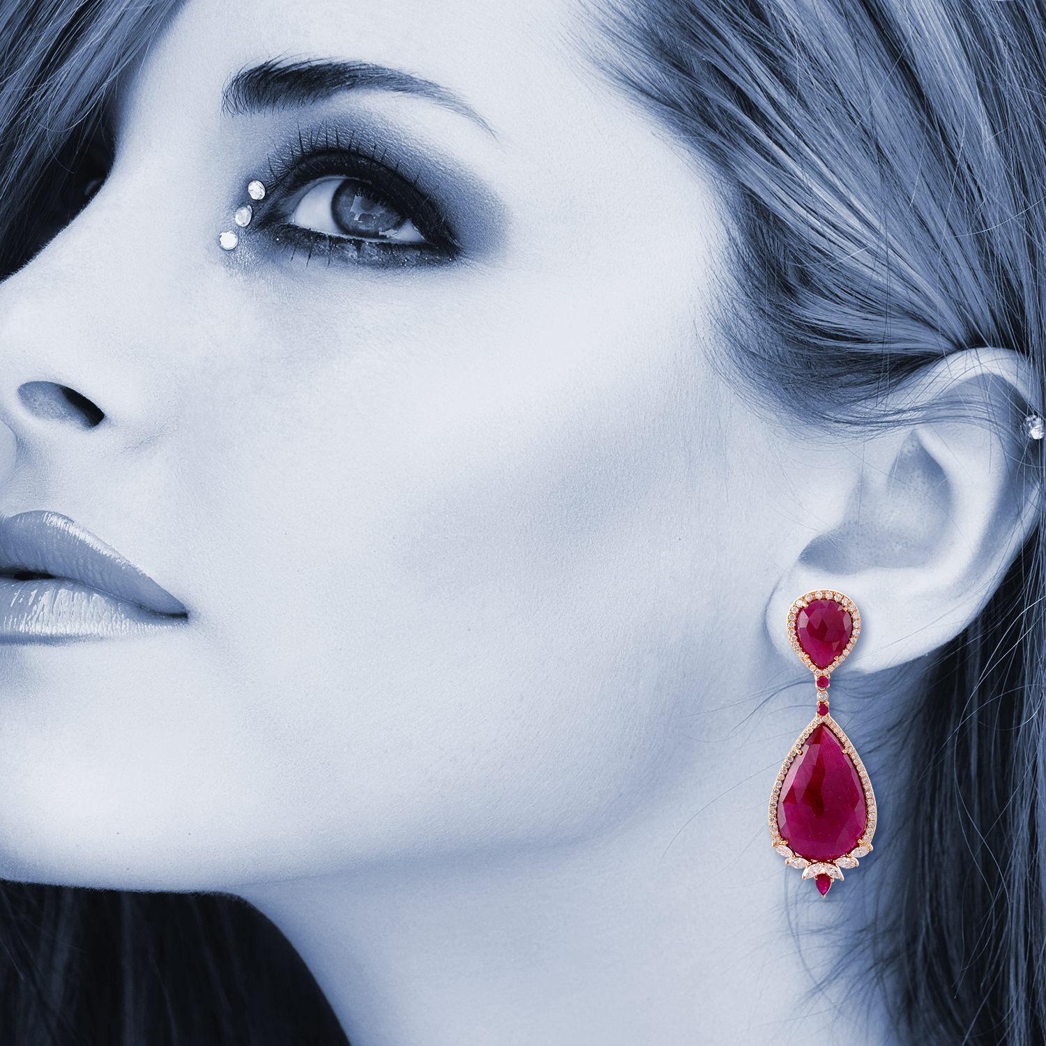 Cast in 18 karat gold. These beautiful earrings are hand set in 49.67 carats rubies & 2.1 carats of sparkling diamonds.

FOLLOW  MEGHNA JEWELS storefront to view the latest collection & exclusive pieces.  Meghna Jewels is proudly rated as a Top