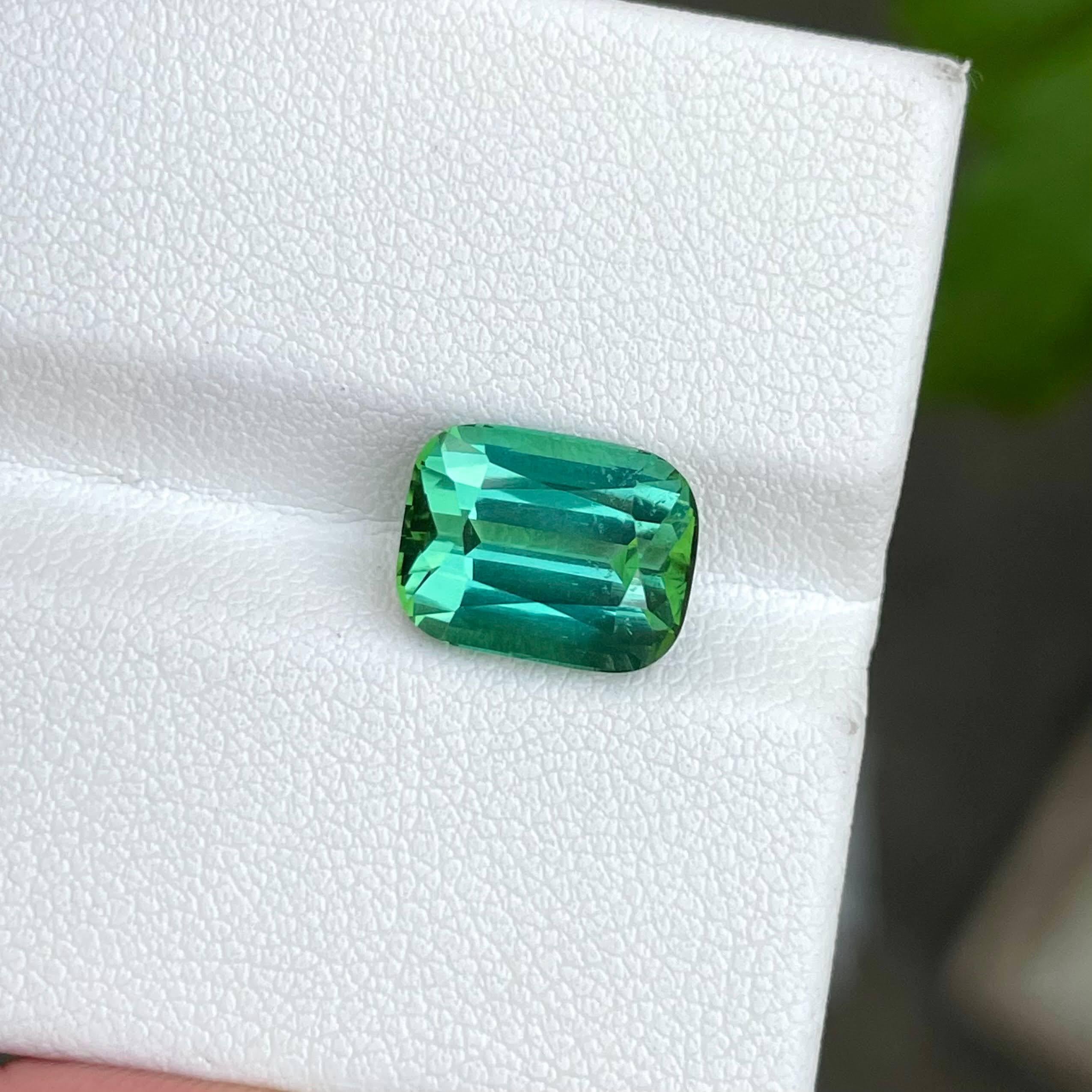 Weight 4.97 carats 
Dimensions 10.7x8.32x6.78 mm
Treatment none 
Origin Afghanistan 
Clarity VVS
Shape cushion 
Cut Fancy cushion




In a breathtaking display of nature's artistry, a 4.97 carat Greenish Blue Tourmaline takes center stage,