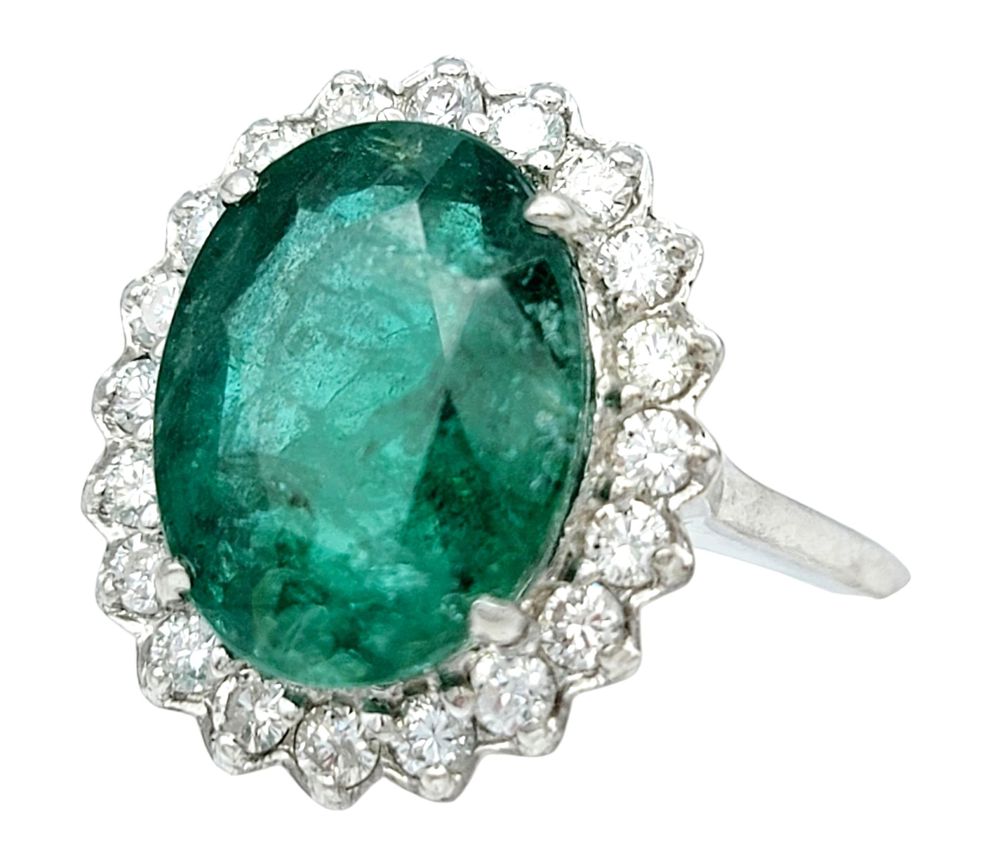 4.98 Carat Oval Cut Emerald and Diamond Halo Ring Set in 18 Karat White Gold In Good Condition For Sale In Scottsdale, AZ