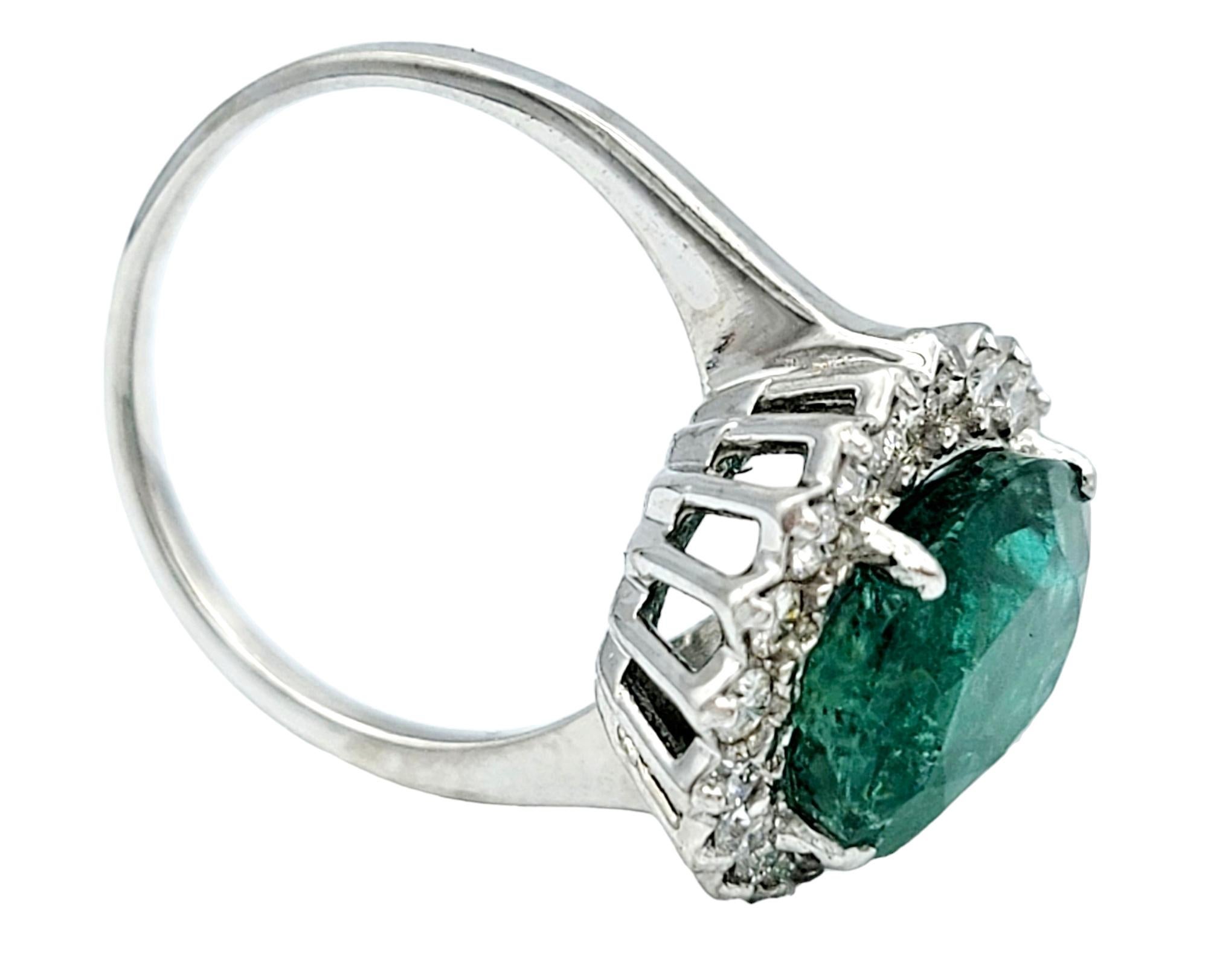 4.98 Carat Oval Cut Emerald and Diamond Halo Ring Set in 18 Karat White Gold For Sale 1