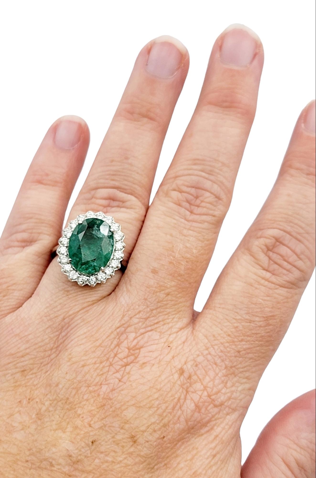 4.98 Carat Oval Cut Emerald and Diamond Halo Ring Set in 18 Karat White Gold For Sale 3