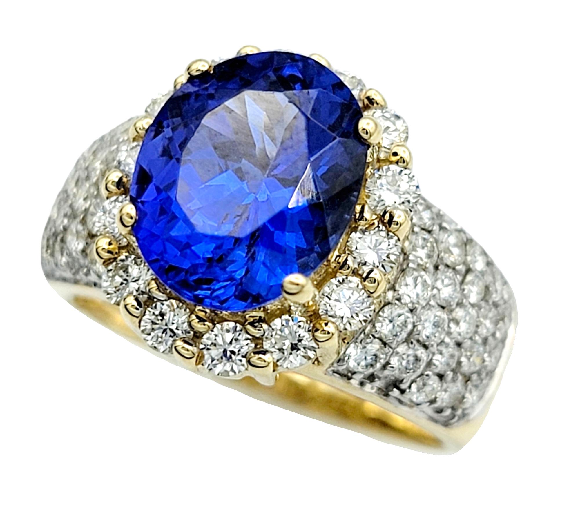 Ring Size: 7

This magnificent tanzanite ring embodies the utmost elegance and allure, with its rich color and brilliant sparkle. At its heart lies an enchanting oval-cut tanzanite, gracing the ring with a captivating deep violet hue that is nothing