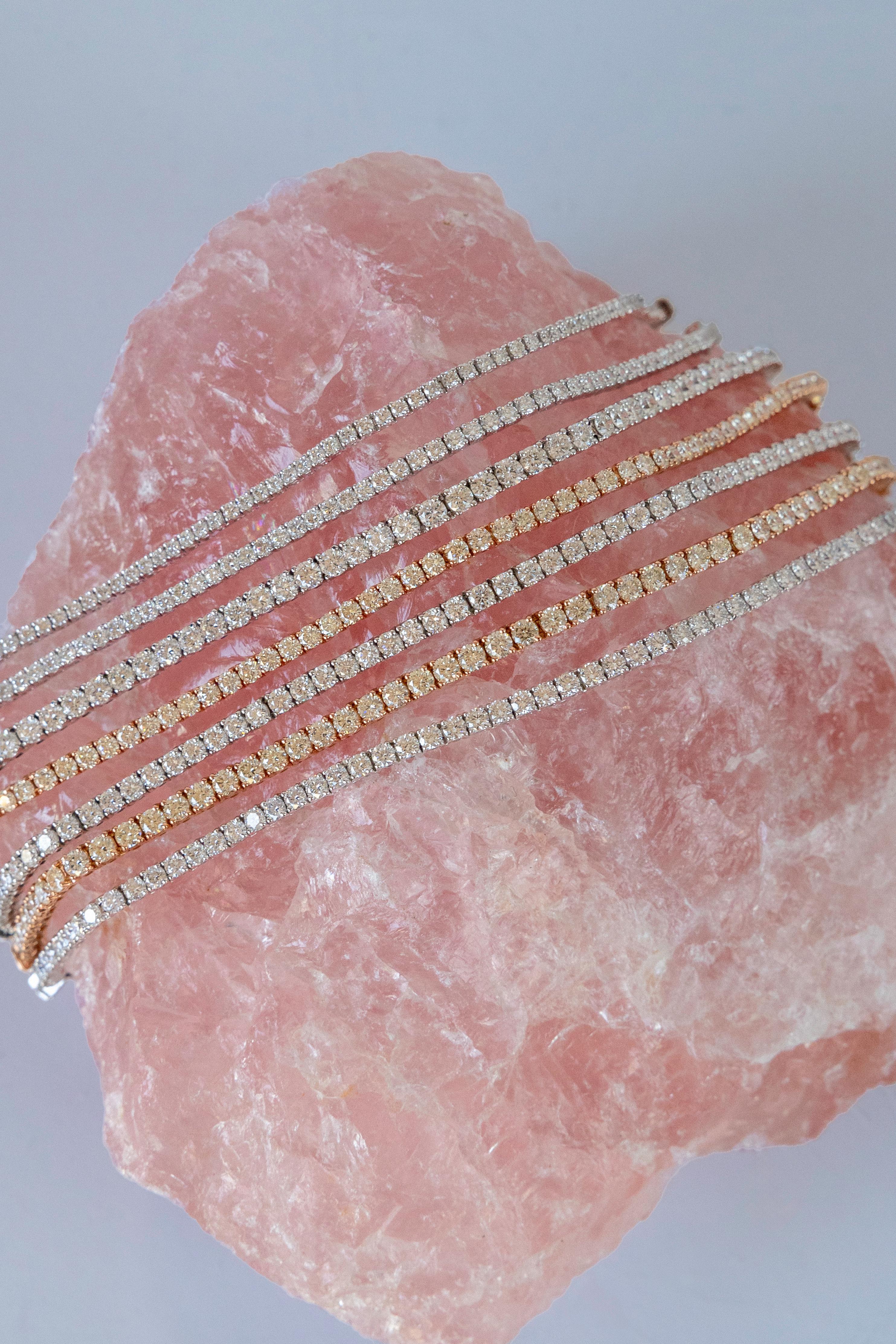 This 4.98 ct Tennis Bracelet features carefully selected 2.80mm FG VS diamonds, set in luxurious white gold. The diamonds’ clarity and brilliance are evident in every facet, creating an exceptional display of light and color with each movement. The