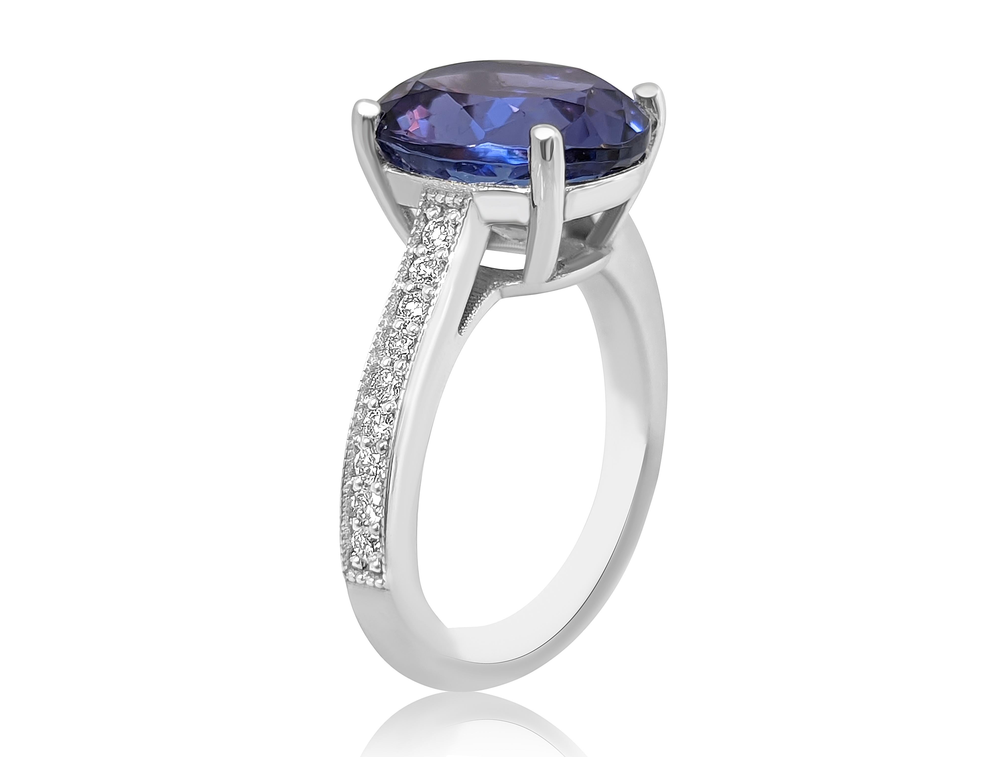 4.99 Carat Tanzanite and 0.20 Ct Diamonds, 14 Kt. White Gold, Ring In New Condition In Ramat Gan, IL