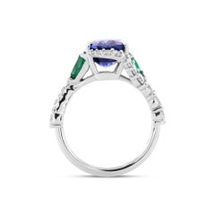 4.99 cts Certified Royal Blue Oval Sapphire, Pear Emeralds, and Diamond Ring