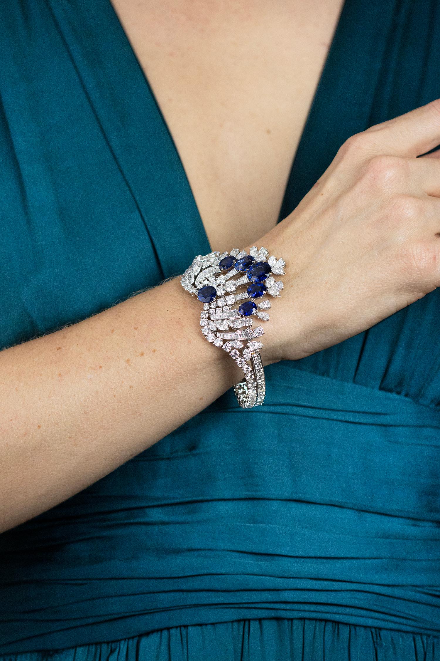 A stunning and important bracelet, featuring six oval cut sapphires weighing 18.50 carats total. Accented with mixed-cut diamonds weighing 31.45 carats total. A gorgeous bracelet, set beautifully on 18K white gold. Length is 7.25 in/18.5 cm. Width