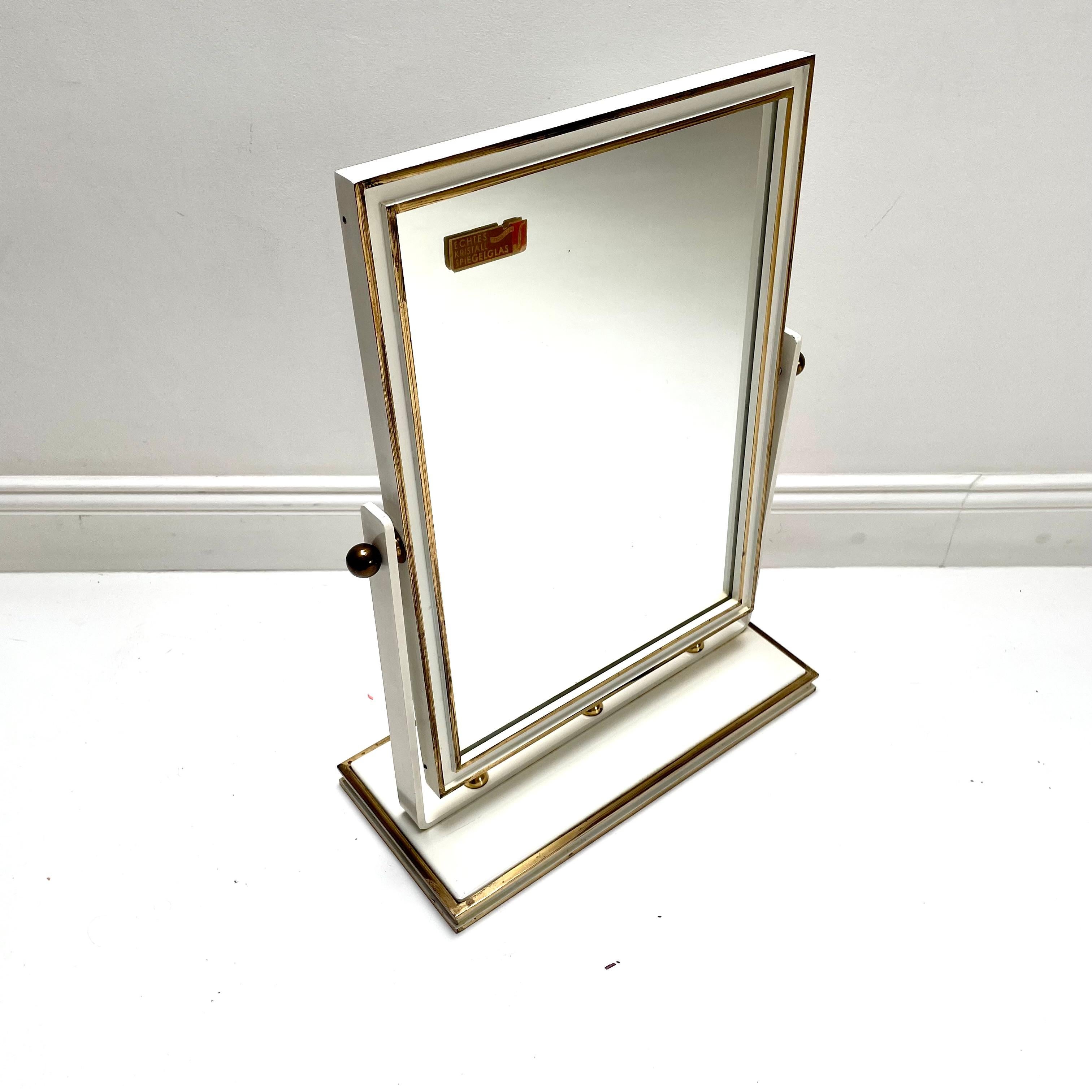 Article:

Table mirror


Producer:

Vereinigte Werkstätten München


Origin:

Germany


Material:

glass, brass, metal 


Decade:

1950s


Description:

This original midcentury table mirror was produced in the 1950s in Germany by the Vereinigte