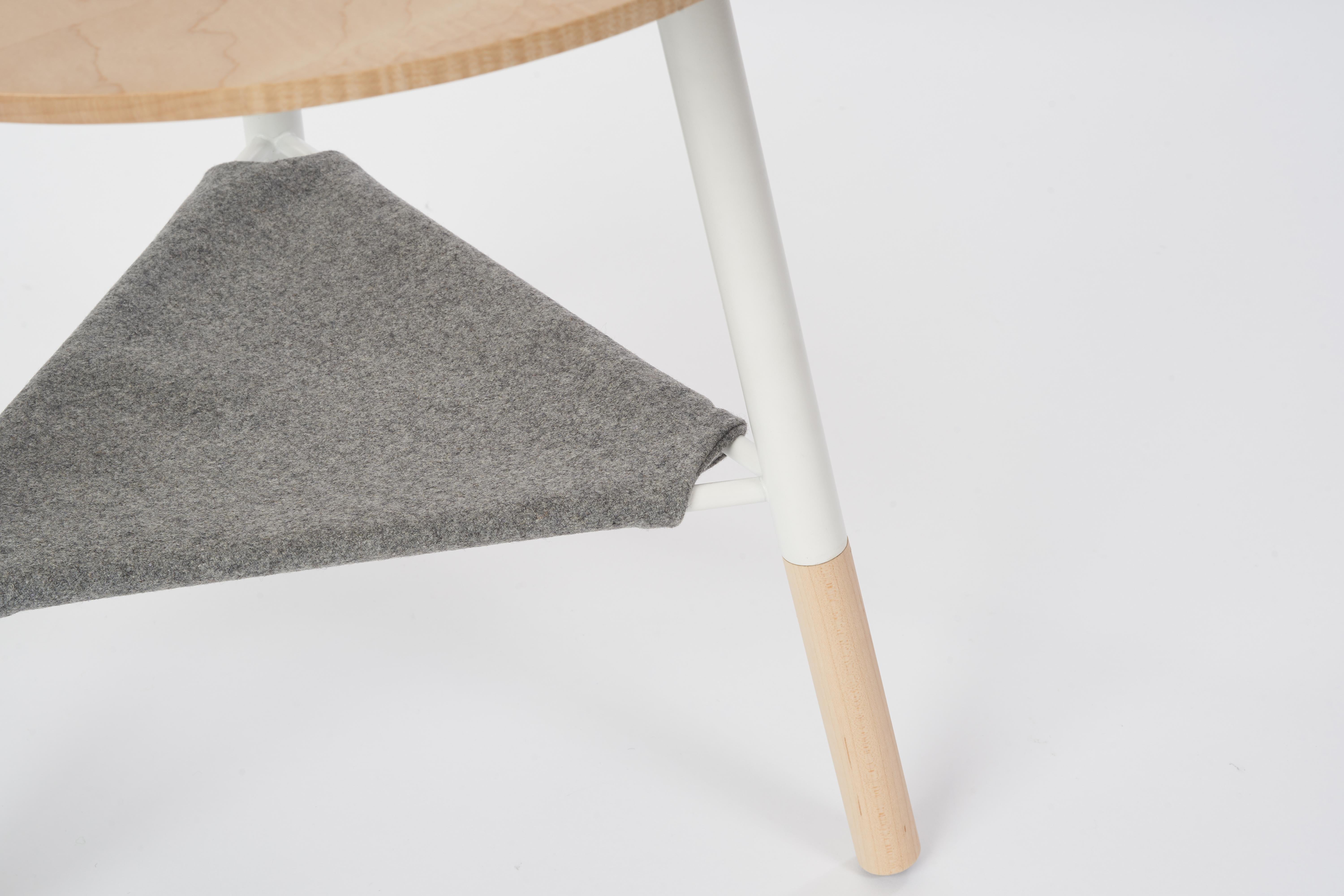 Frame:
Laser-cut, welded cold-rolled steel frame. Custom eco-friendly matted powder-coat finish. 

Wool Hammock Shelf:
Removable premium Italian Melton wool hammock. 

Details:
Commercial grade
COFO Signature laser cut base