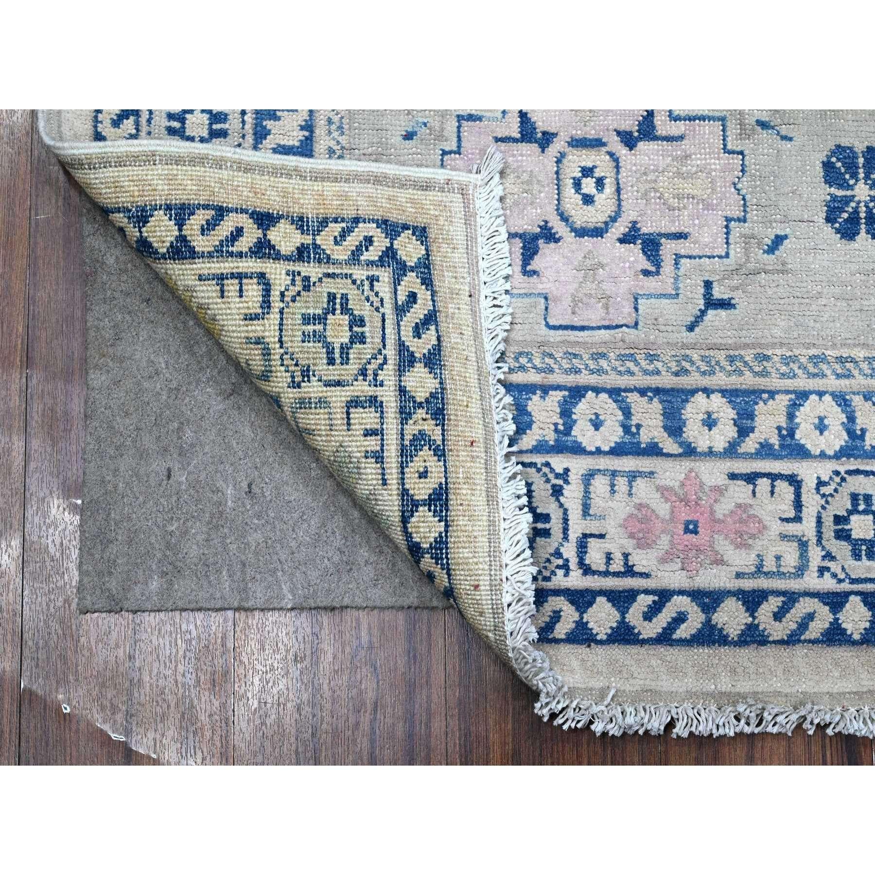 This is a truly genuine one-of-a-kind Fusion Kazak, Hand Knotted, Pure Wool, Oriental Rug. It has been Knotted for months and months in the centuries-old weaving craftsmanship techniques by expert artisans.
Primary materials: Wool
Latex: No Pile
