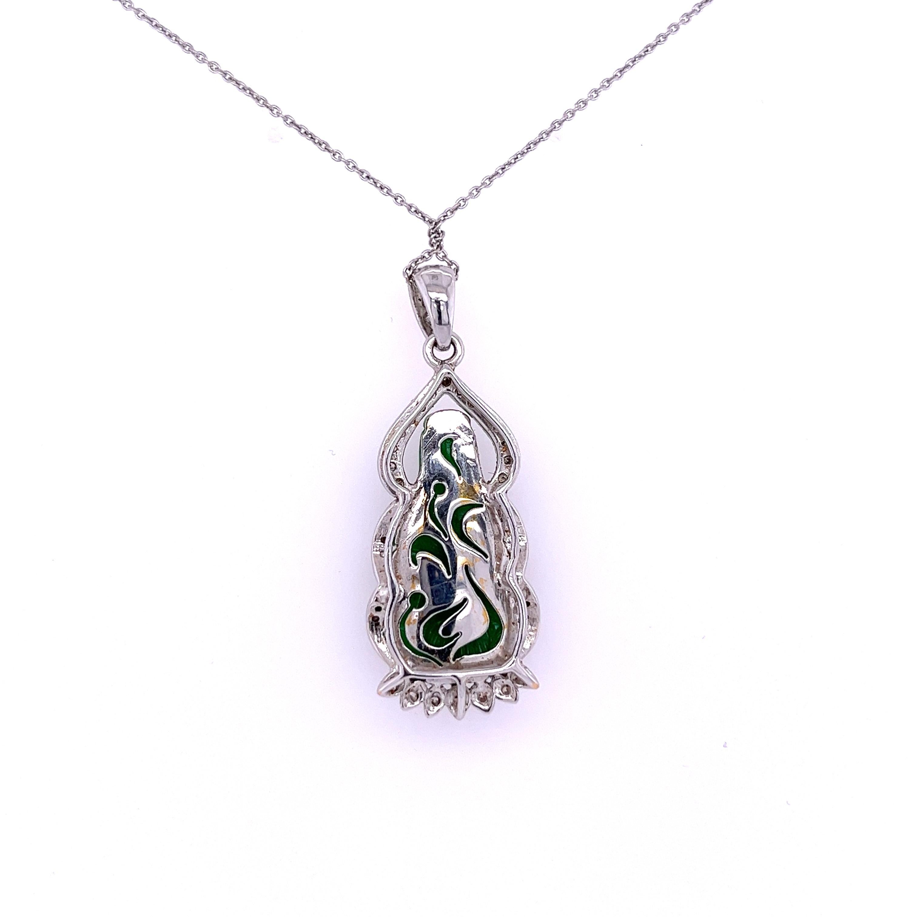 diamond side stones perfectly contrast the vibrance and deep green color hue of the Jade. 

This necklace is a fruitful manifestation of Chinese culture and history. Jade is distinctly Chinese, and a carved Buddha portrait is common in Jade jewelry
