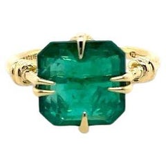 4 Karat Smaragdschliff Forget Me Knot Ring in 18 Karat