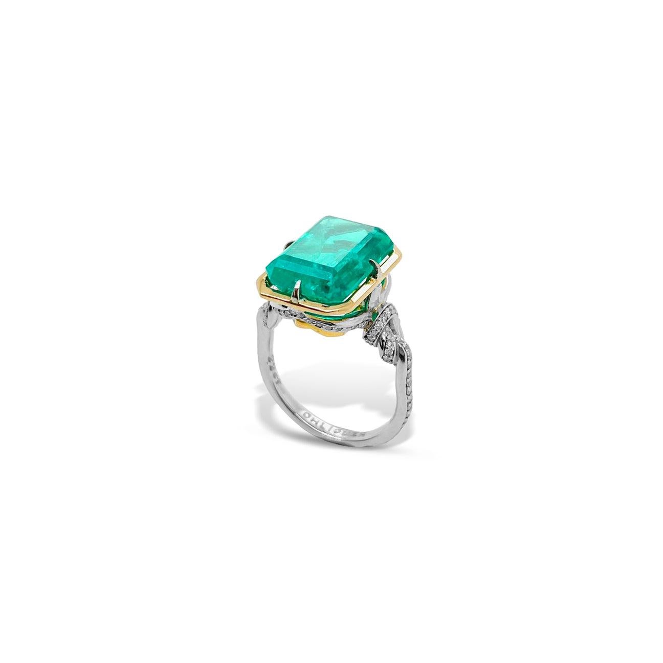 Emerald Cut 4ct Emerald in Forget Me Knot Style Ring