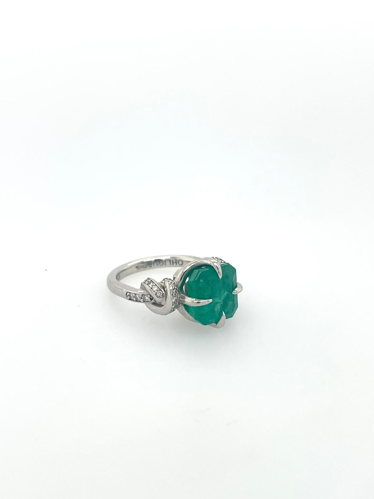 For Sale:  4ct Emerald solitaire in platinum with diamond knots  12