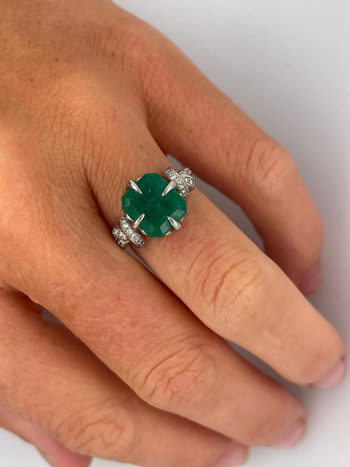 For Sale:  4ct Emerald solitaire in platinum with diamond knots  5