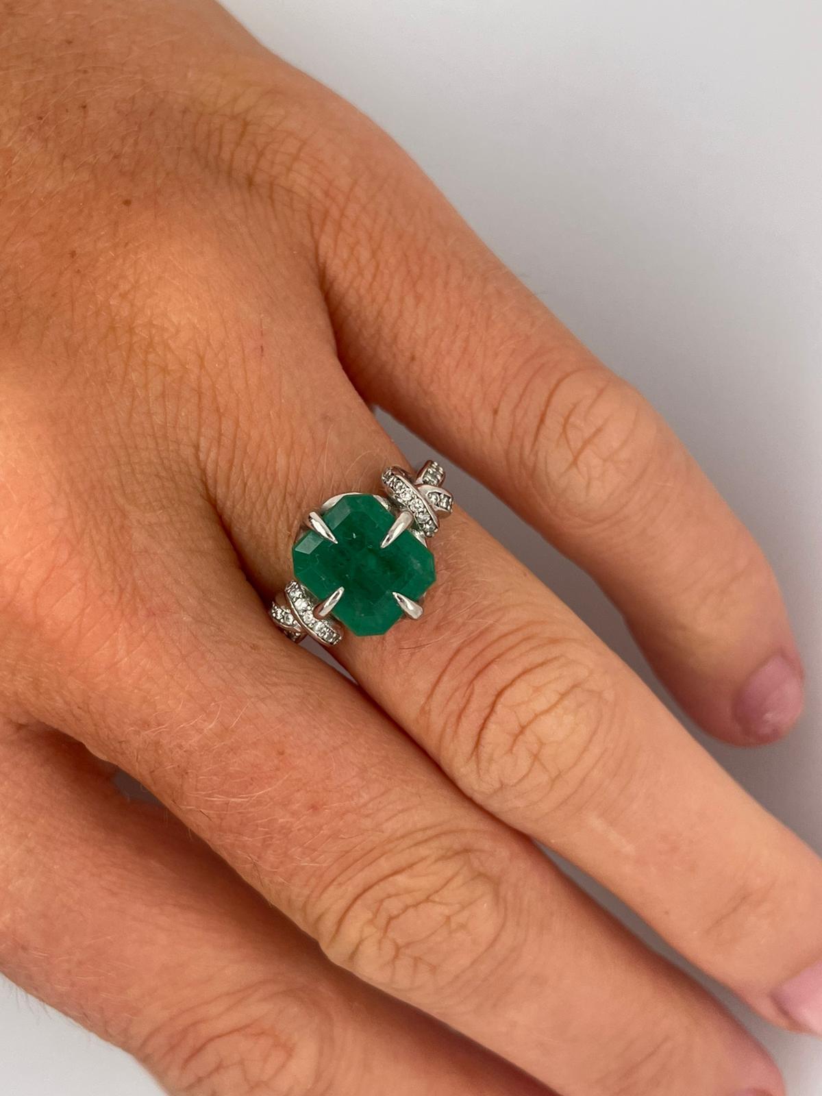 For Sale:  4ct Emerald solitaire in platinum with diamond knots  7
