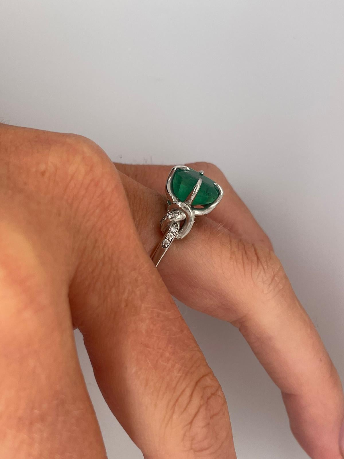 For Sale:  4ct Emerald solitaire in platinum with diamond knots  8