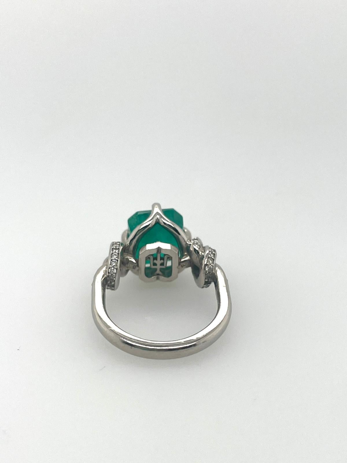 For Sale:  4ct Emerald solitaire in platinum with diamond knots  9