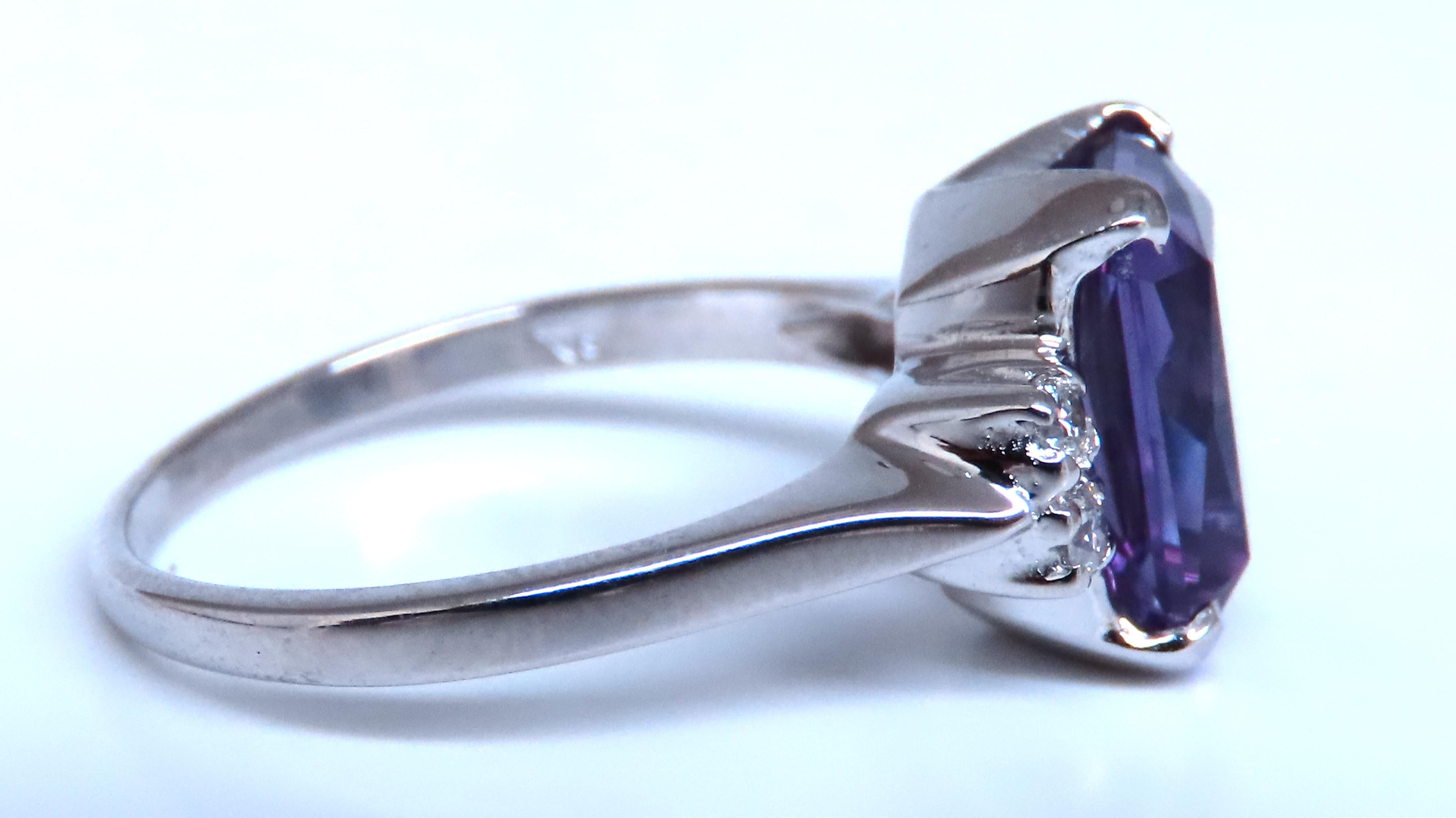 4ct Lab Alexanderite Ring
.10ct Natural Diamonds
G-color Vs-2 clarity,
10Kt White gold
3.2 grams
size 6.5

Depth of ring 6.2mm