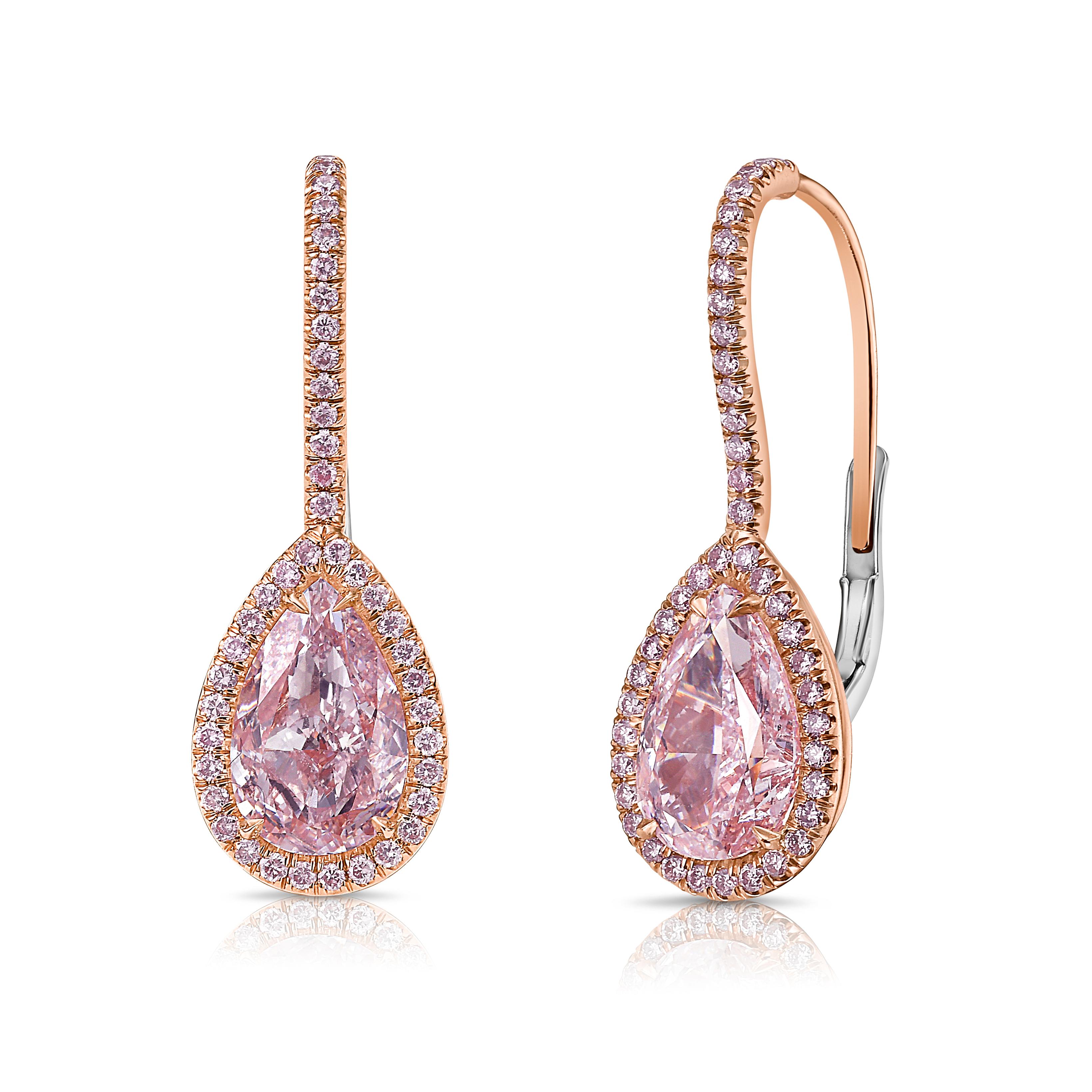 2.02 and 2.22 Carat Center Diamonds
Light Pink Pear Shapes
VS1 and VS2
0.42 Carats of Surrounding Pink Diamonds
Excellent + Very Good cutting
Set in 18k White Gold with 14k Rose Gold plating
GIA Certified Diamonds
Handmade in NYC

This piece can be