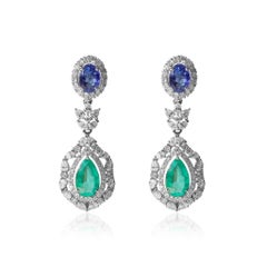 4ct Emerald & 2ct Tanzanite Double Halo Diamond Dangle Earrings in 18K WhiteGold
