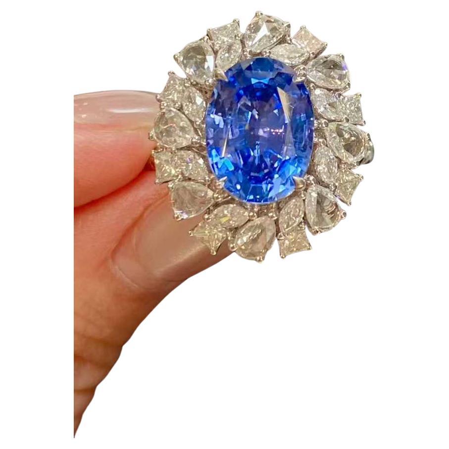 Bague halo en saphir ovale de 4ct et diamant blanc de 2.20ct en 18k Whiting