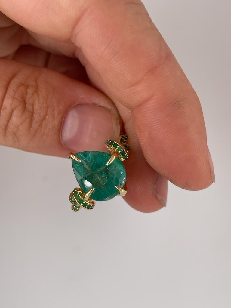 4ct pear cut emerald solitaire with emeralds in 18ct yellow gold 9