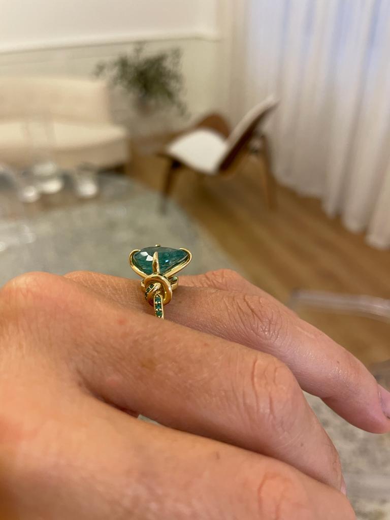 4ct pear cut emerald solitaire with emeralds in 18ct yellow gold 15
