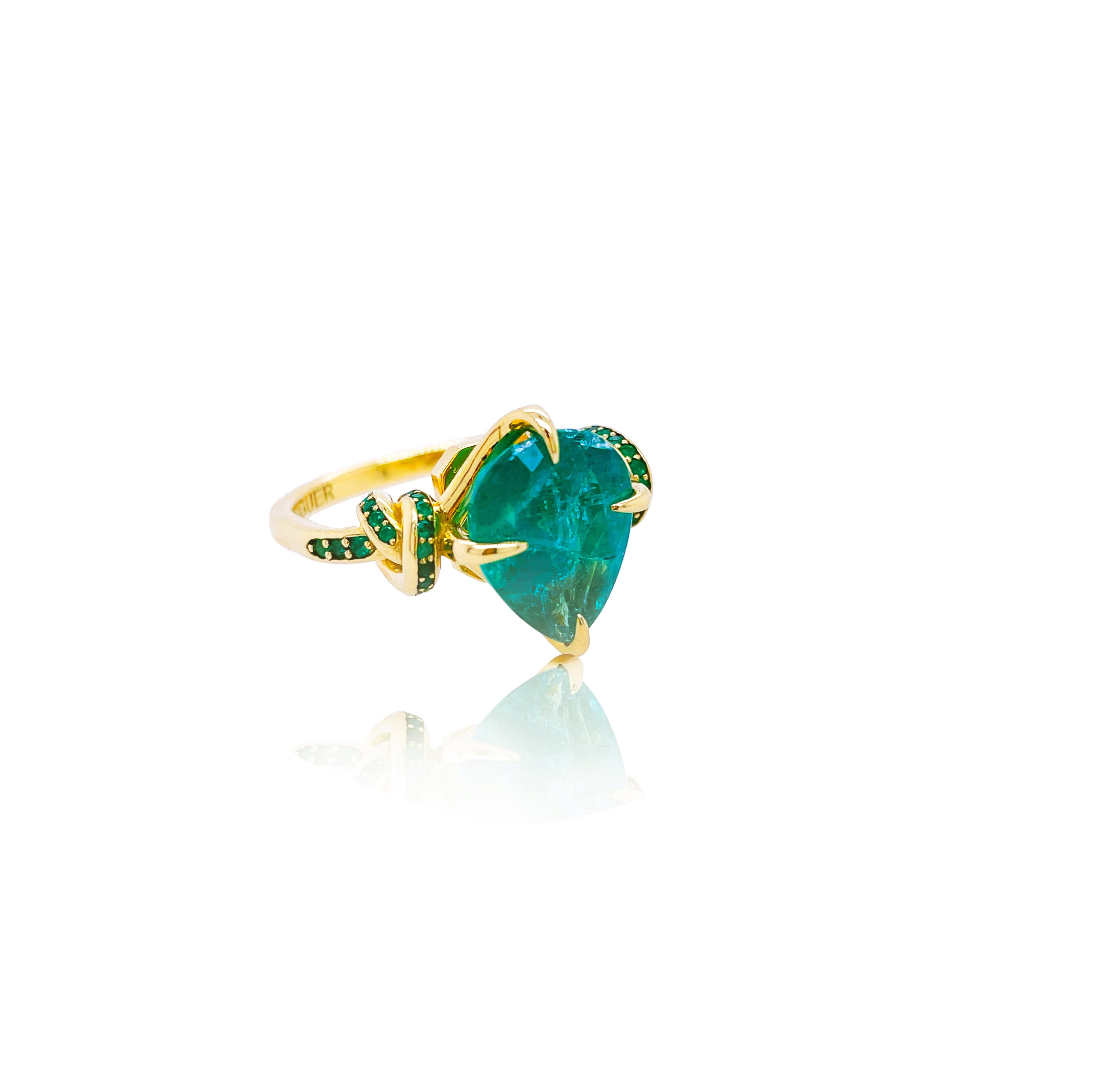 Pear Cut 4ct pear cut emerald solitaire with emeralds in 18ct yellow gold