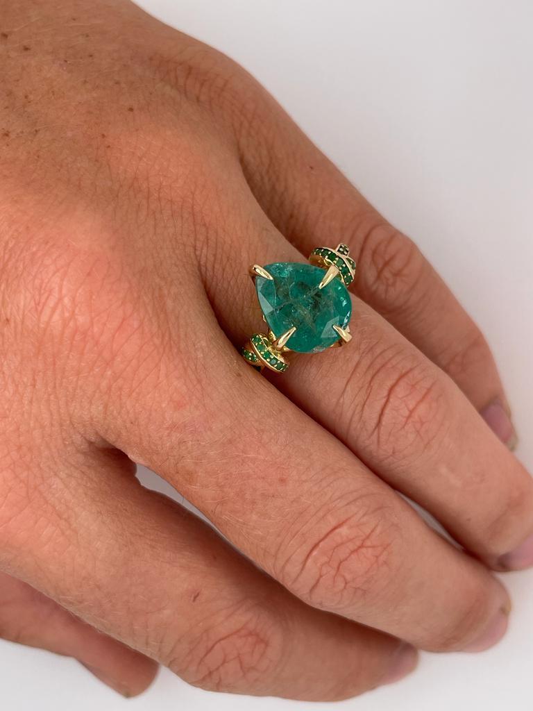 4ct pear cut emerald solitaire with emeralds in 18ct yellow gold 4