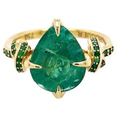 4ct Pear Cut Emerald Solitaire with Emeralds in 18ct Yellow Gold